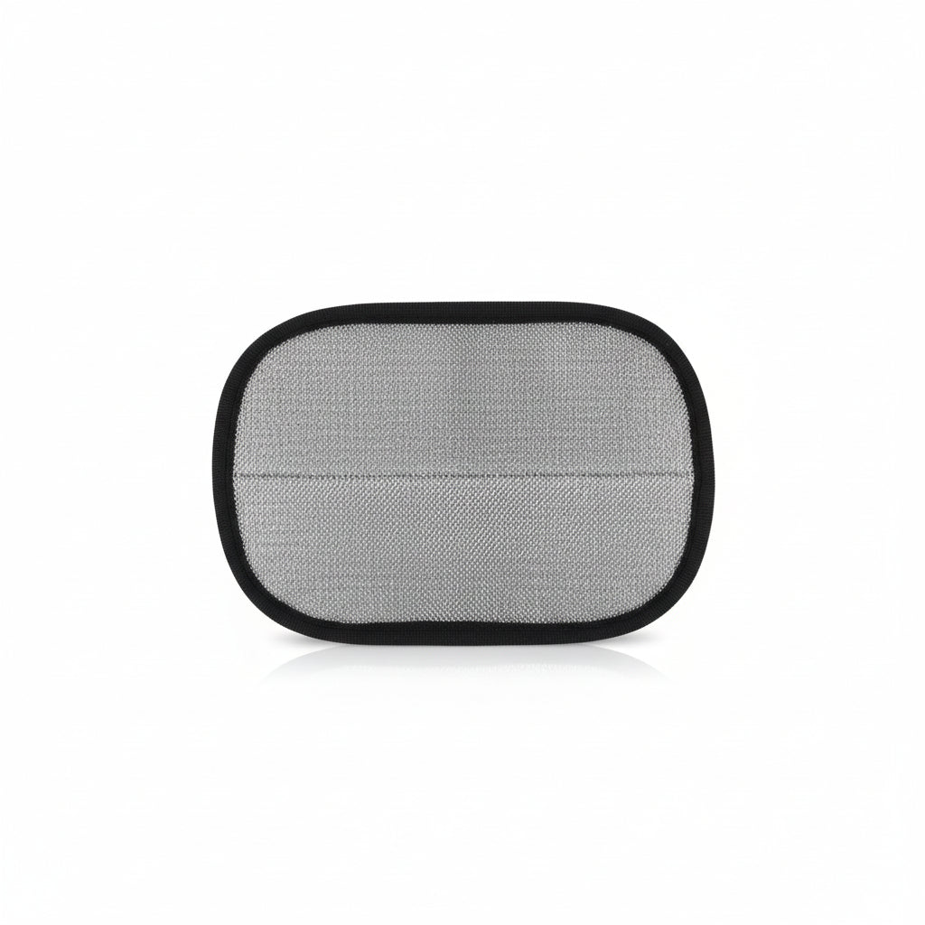 Hand holding a square mesh screen against a wooden floor background